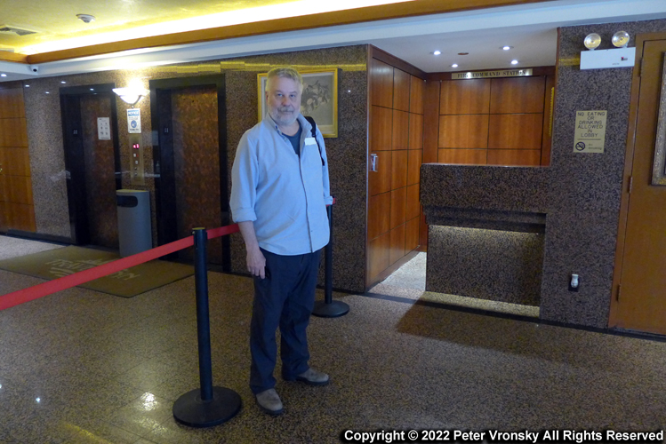 Peter Vronsky at the elevator doors where 42 years earlier he encountered serial killer Richard Cottingham, the Torso Killer as he was fleeing the scene.